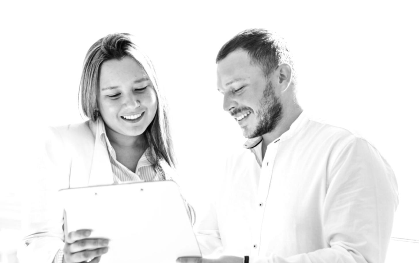 Person working on laptop with financial planning tools